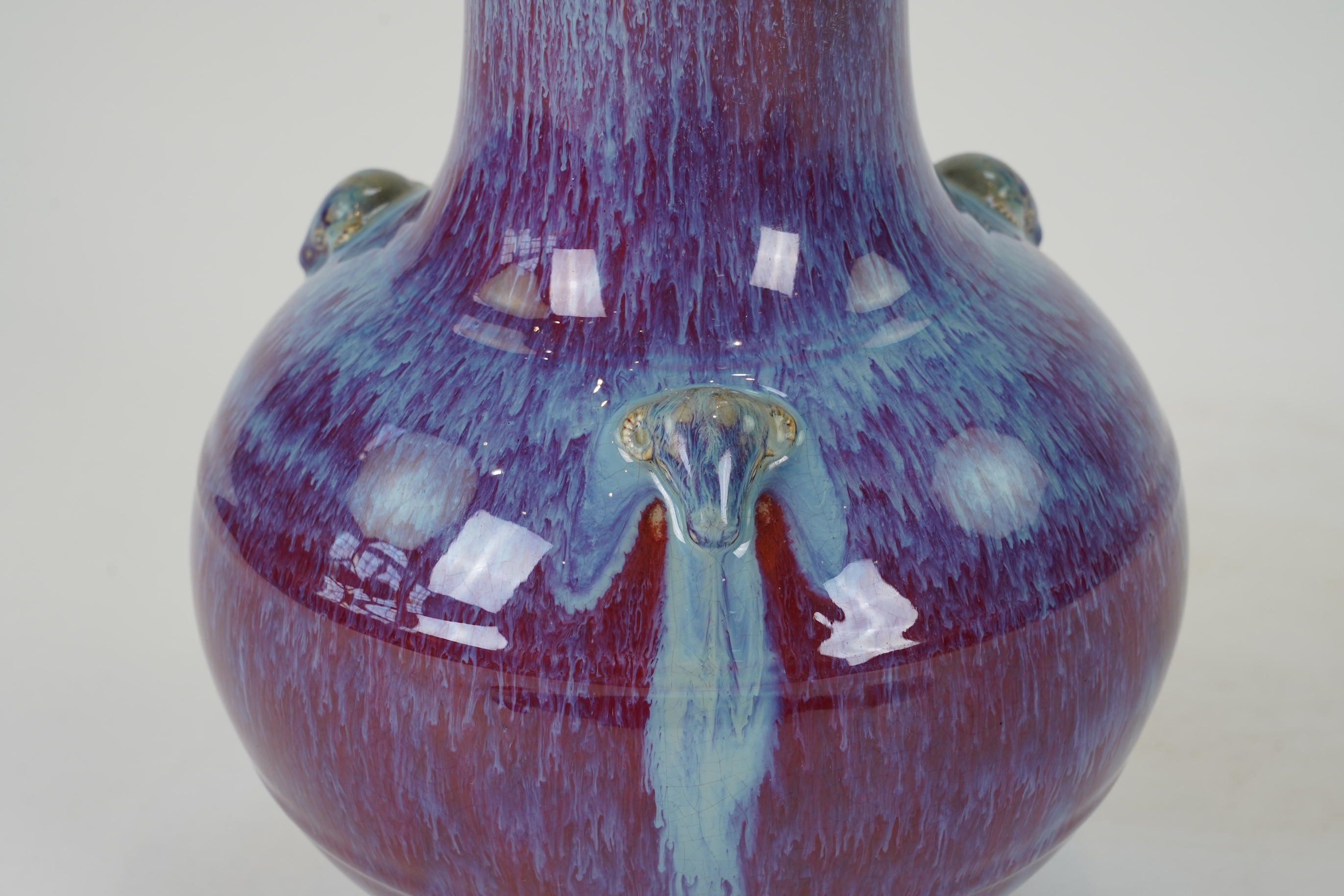 A Chinese flambé glazed ‘three rams’ vase, sanxizun, Qianlong six character seal mark and of the period (1736-95)